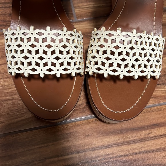 Never worn women sandals. White wedge sandals size 11
